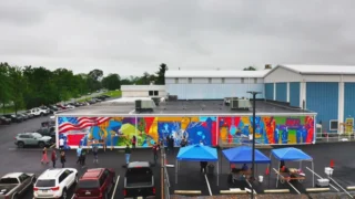 A vibrant tribute to American Crane’s heritage, people, and future — We’re excited to reveal a stunning new mural at our headquarters in Douglassville, PA

Led by Stephanie Delibertis and created with artists Mike Miller and Greg Didyoung, this collaborative piece reflects our commitment to innovation, community, and the motto that drives us:
Always Lift. Never Quit.

Thank you so much to everyone who helped make this possible by putting their time and energy into painting and installing this mural. 

If you haven’t checked it out yet, what are you waiting for?!

#berkscountymurals #AlwaysLiftNeverQuit #muralart #mural #companyculture #industrialart